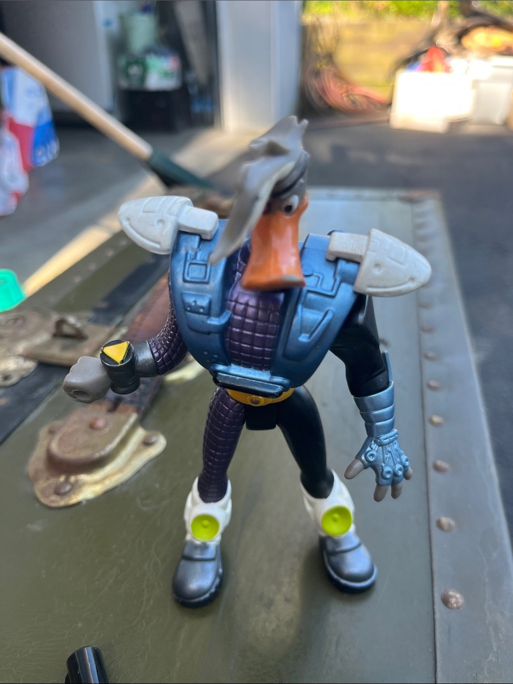 Anthropomorphic Duck Action Figure with Blue Armor and Orange Beak